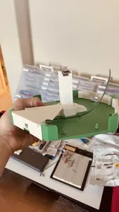 Assembled green and white hub.