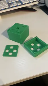 Early printed cube body, base, and contact plate.