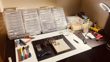 Electronics assembly at the workbench.
